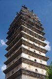 The Bai-style Dongsi Ta or East Pagoda dates originally from the Tang Dynasty (618 - 907), but at this time Kunming was part of the Nanzhao Kingdom. Western sources believe it was destroyed in the late 19th century during the Muslim Rebellion. Chinese sources maintain that it was destroyed by an earthquake. It was rebuilt in 1901.<br/><br/>

Nanzhao (also Nanchao and Nan Chao) was a Buddhist kingdom that flourished in what is now southern China and Southeast Asia during the 8th and 9th centuries.